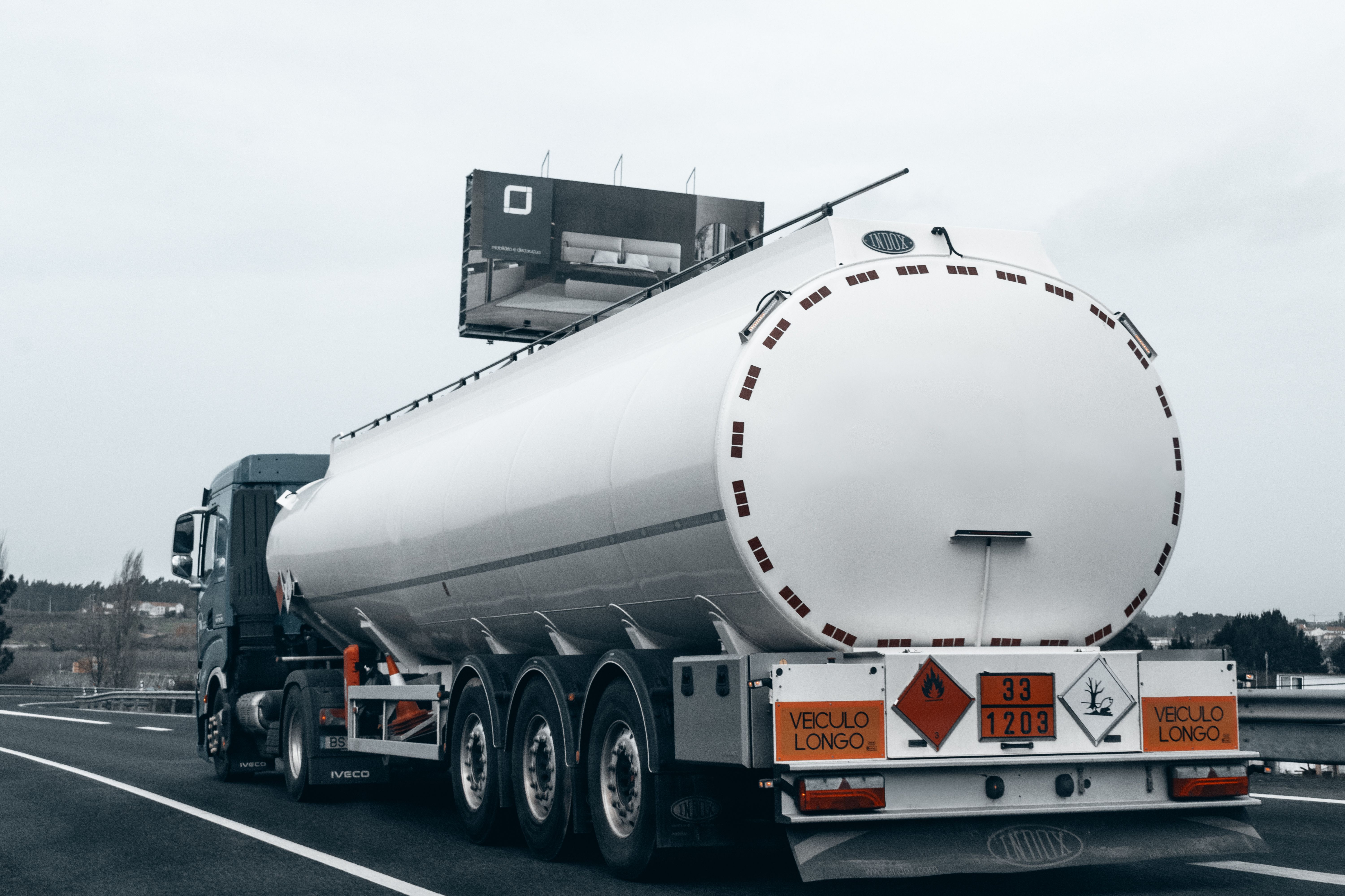 CDL hazmat endorsement — hazardous materials tanker truck on highway
